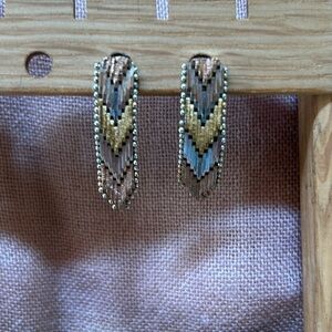Mixed metal earrings dangle